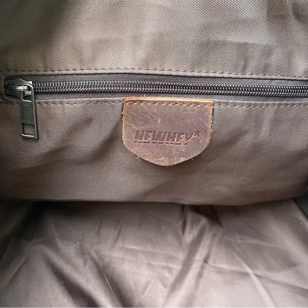 Grayish brown cotton/leather travel bag